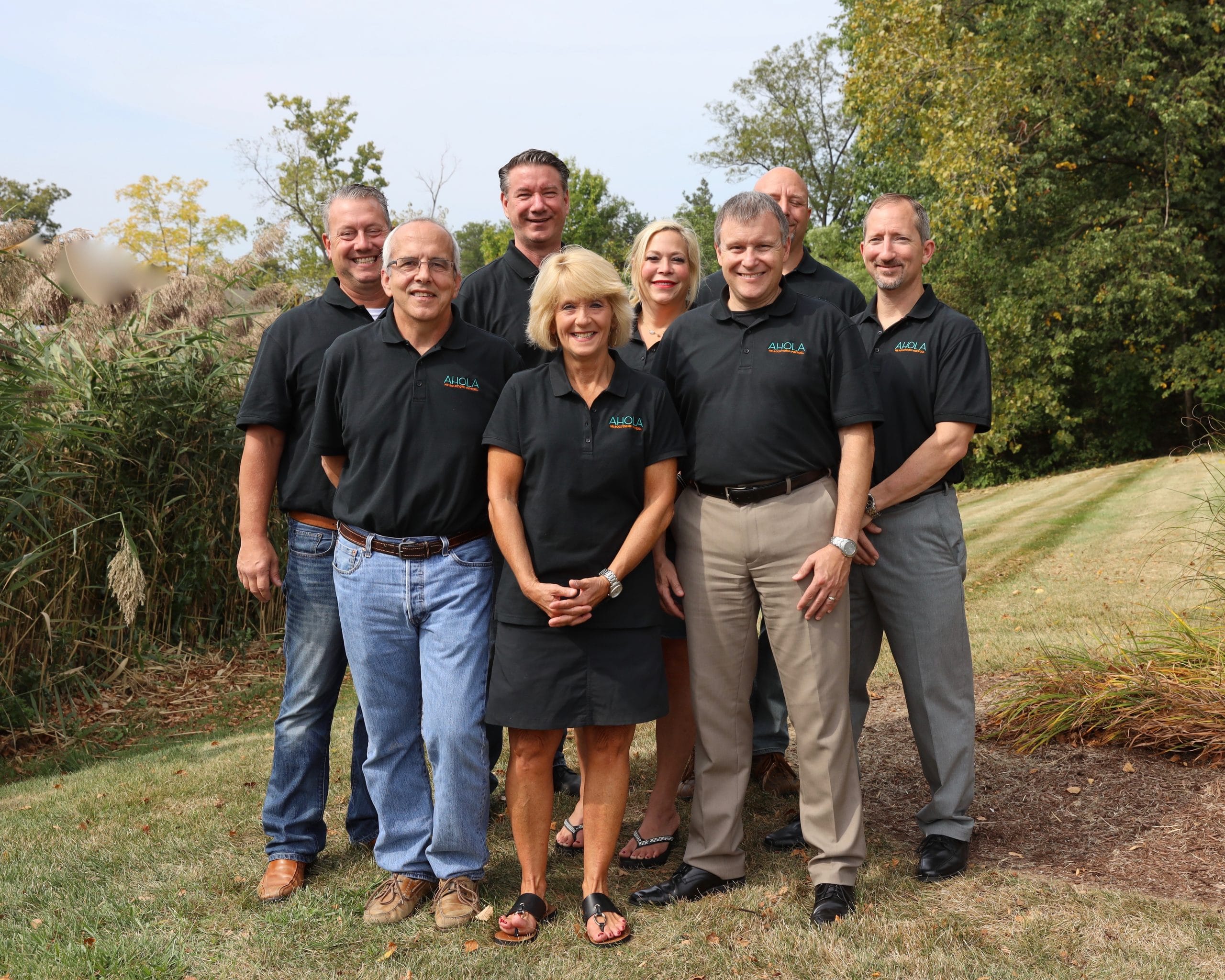 A group of Ahola employees smiling